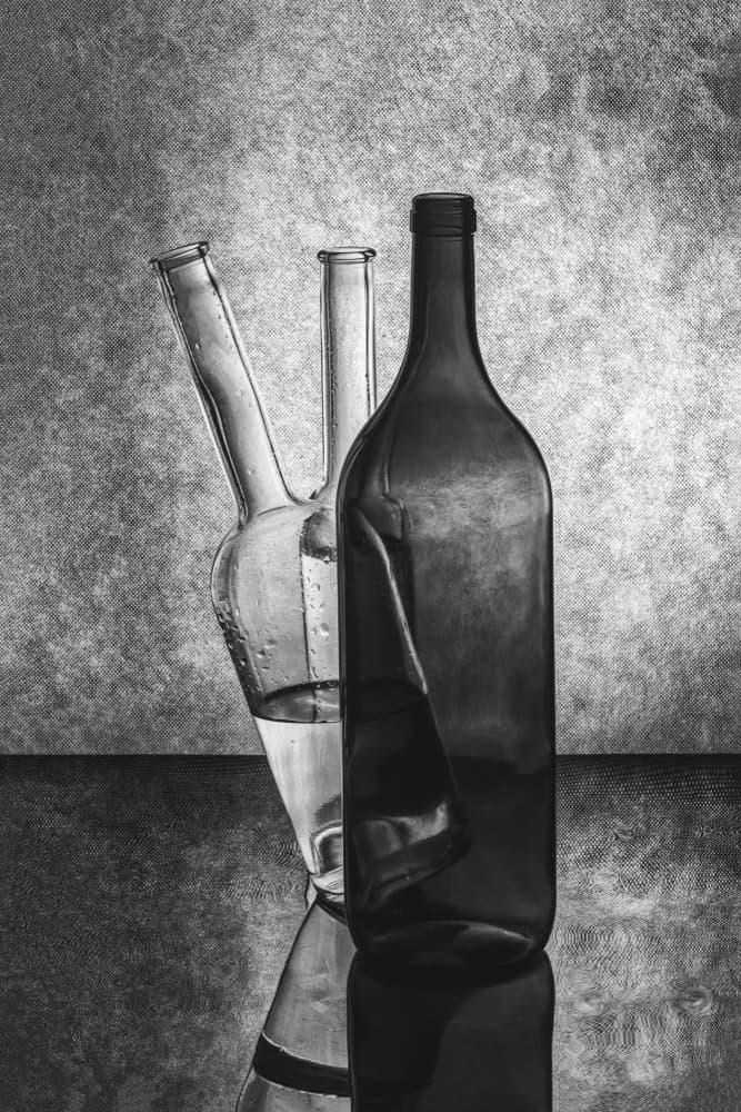 Monochrome Glass Bottles by Brig Barkow — canvas wall art
