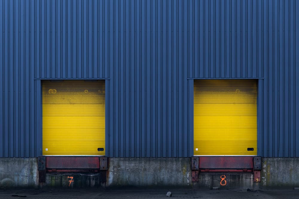 Bold Blue Yellow Doors by Jef Van den Houte — canvas wall art