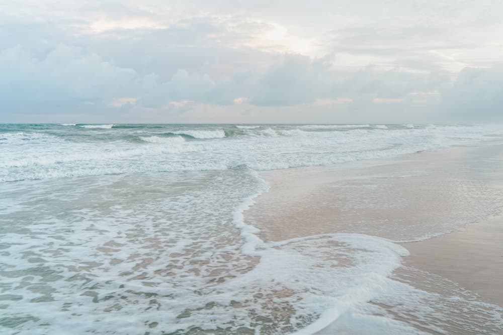 Tranquil Beach Waves by Courtney Crane — canvas wall art
