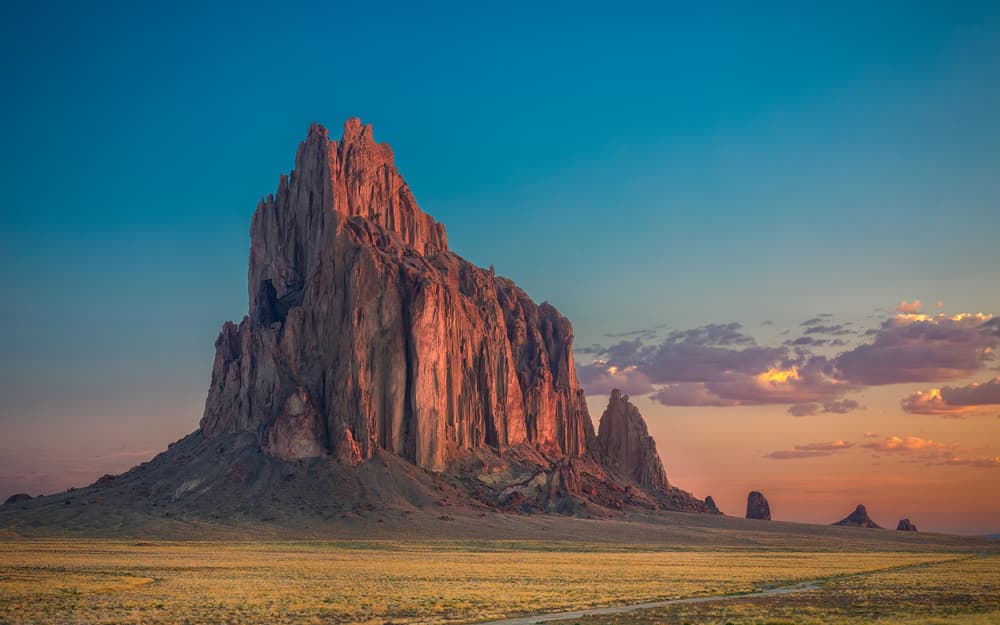 Sunset Over Desert Peaks by Michael Zheng — canvas wall art
