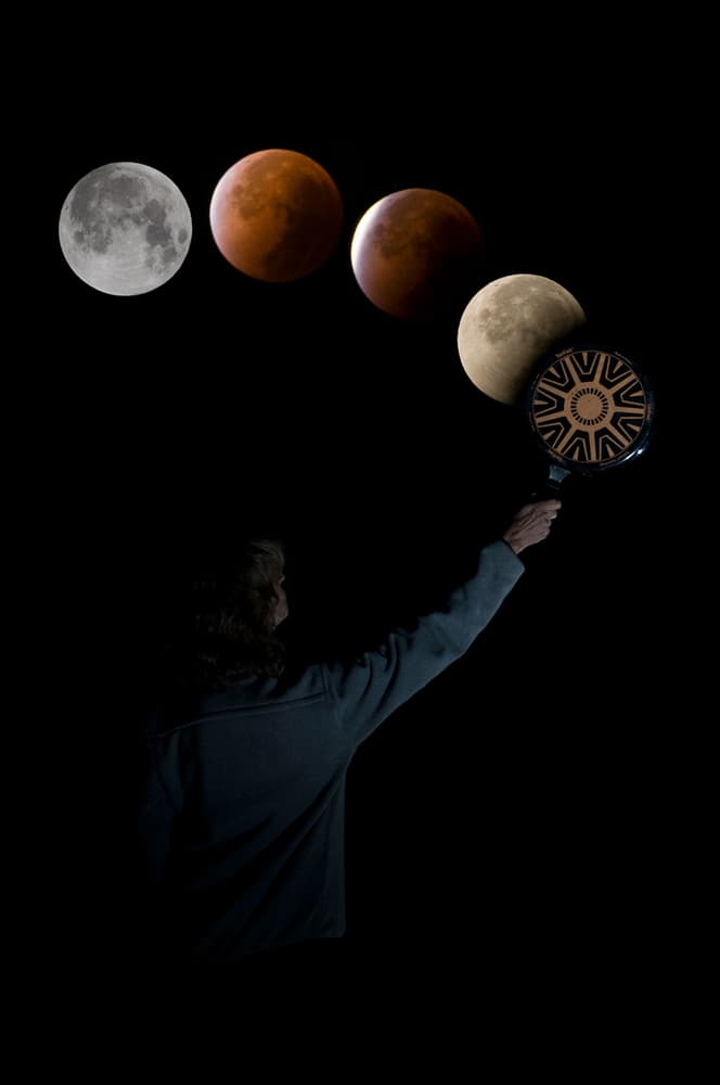 Catching the Blood Moon by Christian Roustan (Kikroune) — canvas wall art