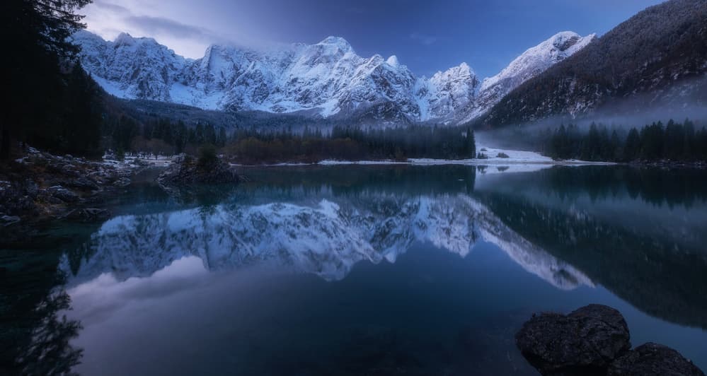 Snowy Mountain Reflections by Ales Krivec — canvas wall art