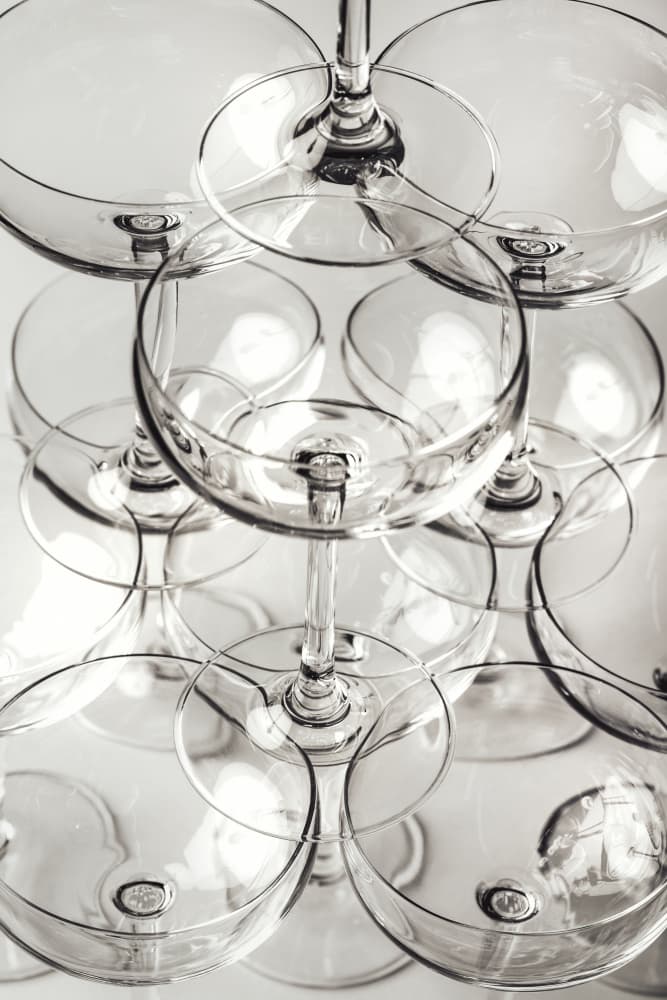 Stacked Champagne Coupes by Pictufy Studio III — canvas wall art