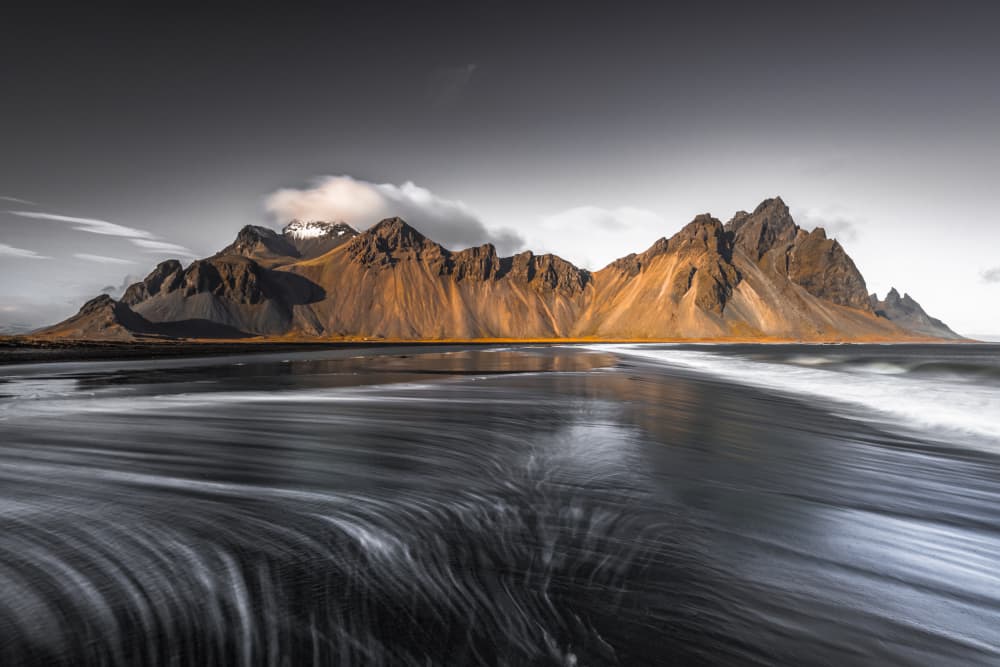 Golden Peaks Black Beach by Jacek Swiercz — canvas wall art