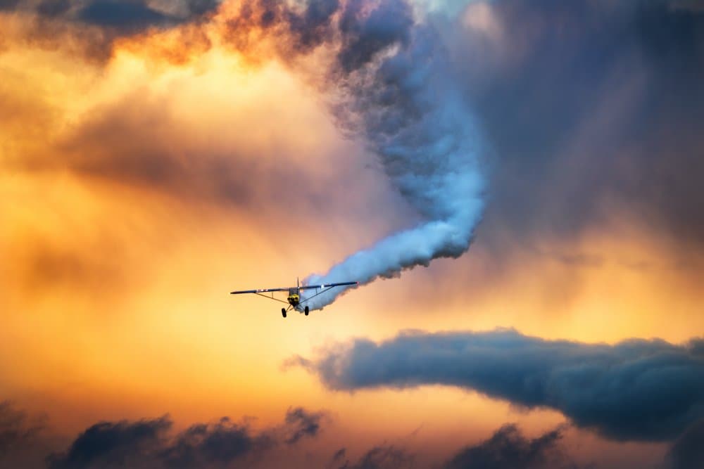 Aerobatic Sunset Sky by Piotr Wrobel — canvas wall art
