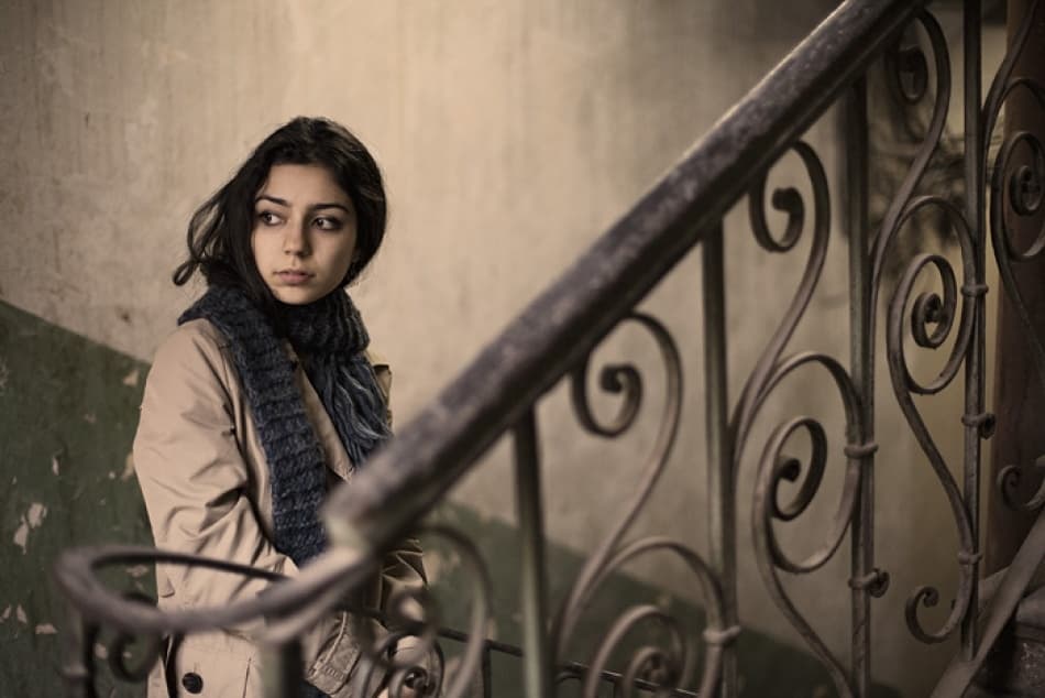 Pensive Woman Old Stairway by Suren Manvelyan — canvas wall art