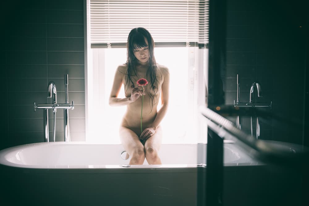 Serene Nude With Flower by Daisuke Kiyota — canvas wall art