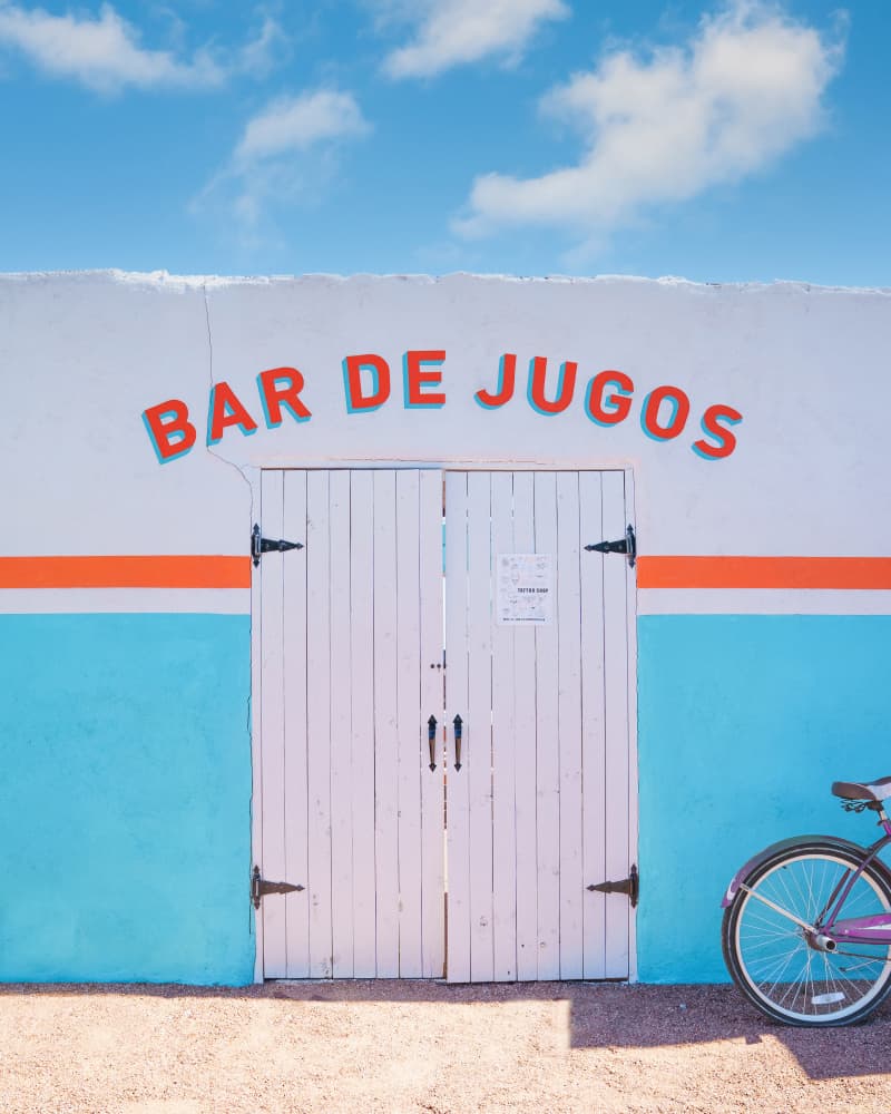 Bar De Jugos by Tom Windeknecht — canvas wall art