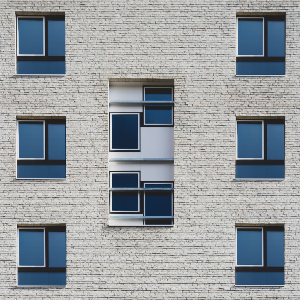 Geometric Brick Facade by Luc Vangindertael (laGrange) — canvas wall art