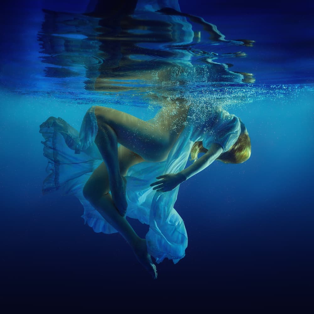 Floating Woman Underwater by Dmitry Frizel — canvas wall art