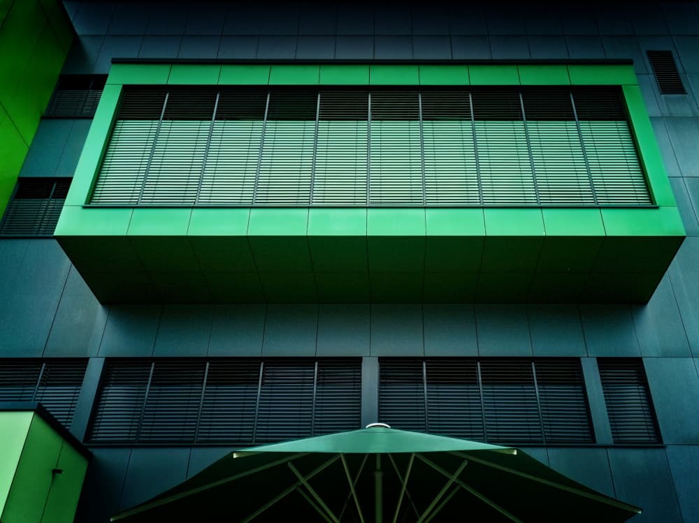 Green Geometric Facade by Jürgen Muß — canvas wall art