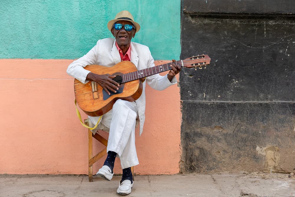 Vibrant Cuban Guitarist by Joan Gil Raga — canvas wall art