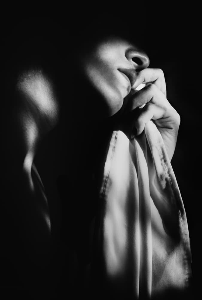 Shadowed Face and Hand by Toni Fidanza — canvas wall art