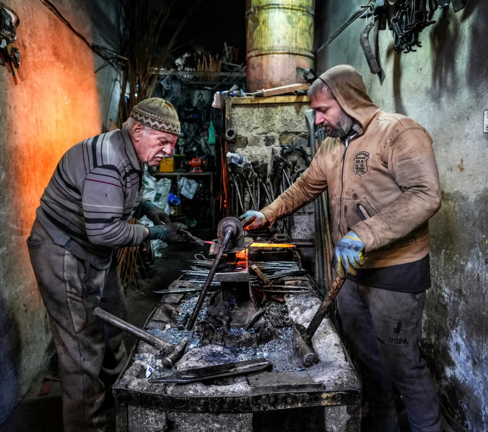 Forging Hot Metal by Bashar Alsofey — canvas wall art