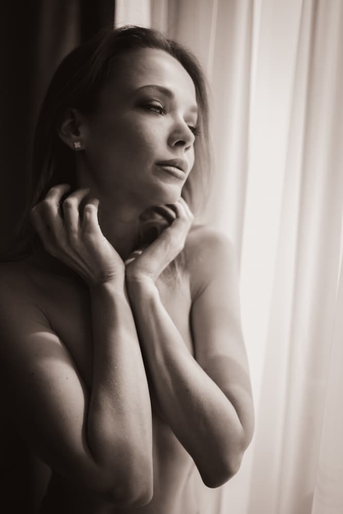 Thoughtful Woman Window Light by Guenther Koci purephoto.at — canvas wall art