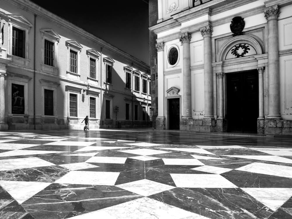 Unicyclist on Grand Plaza by Michel Guyot — canvas wall art