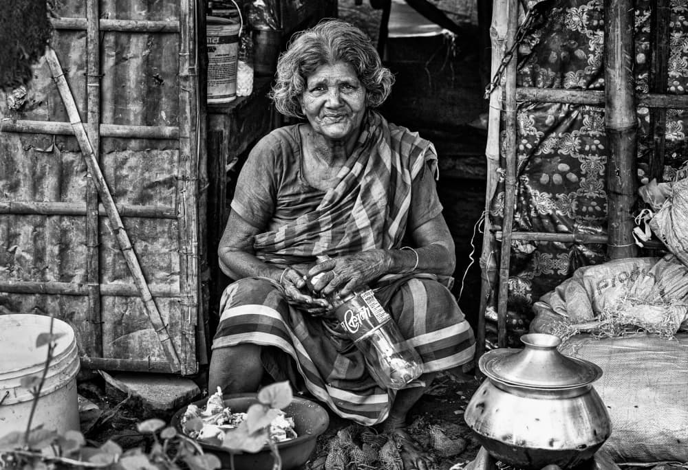 Elderly Woman Smiling by Joxe Inazio Kuesta Garmendia — canvas wall art
