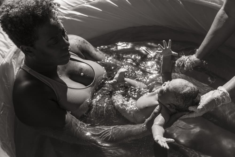 Water Birth Embrace by Amalya Shandelman — canvas wall art