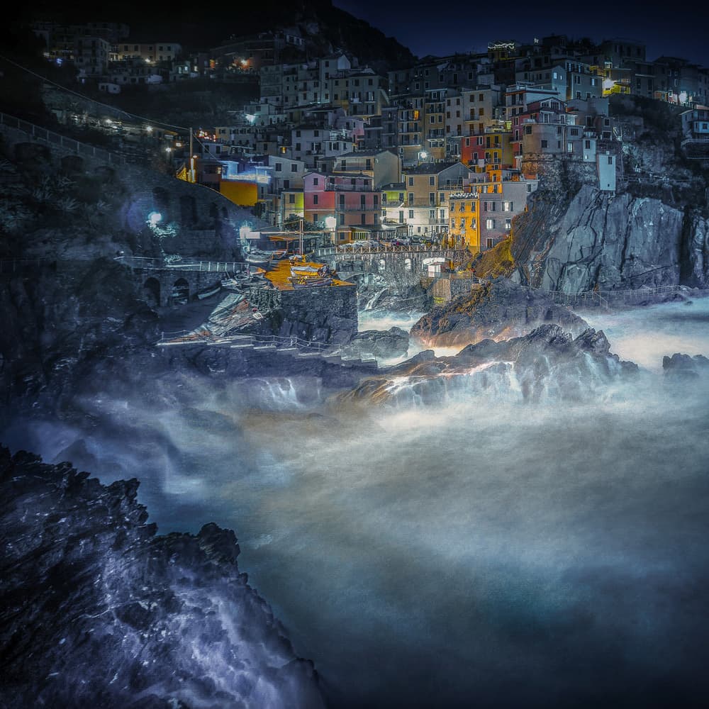 Illuminated Coastal Village by Alessandro Traverso — canvas wall art