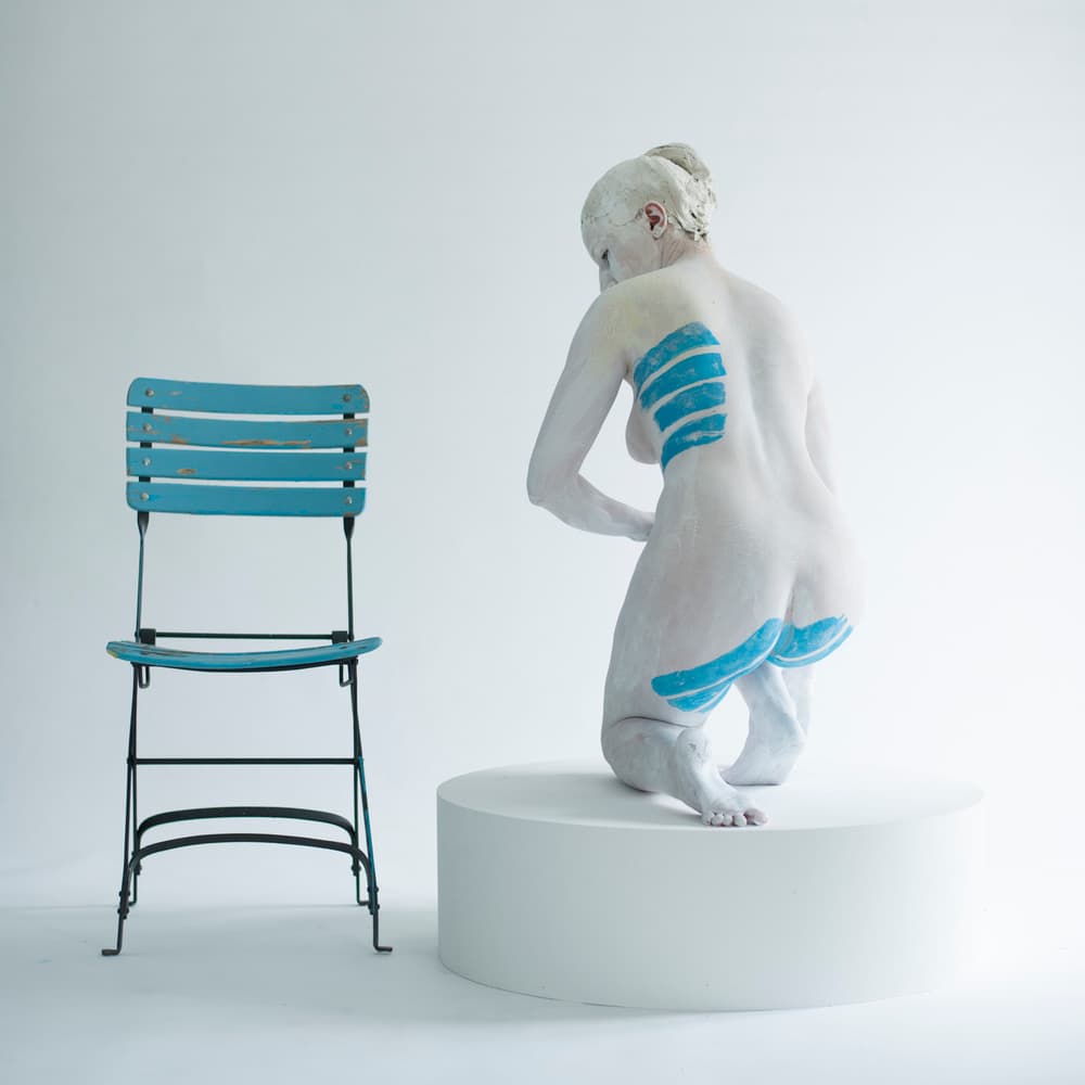 Blue Stripes Kneeling Figure by woodplane — canvas wall art