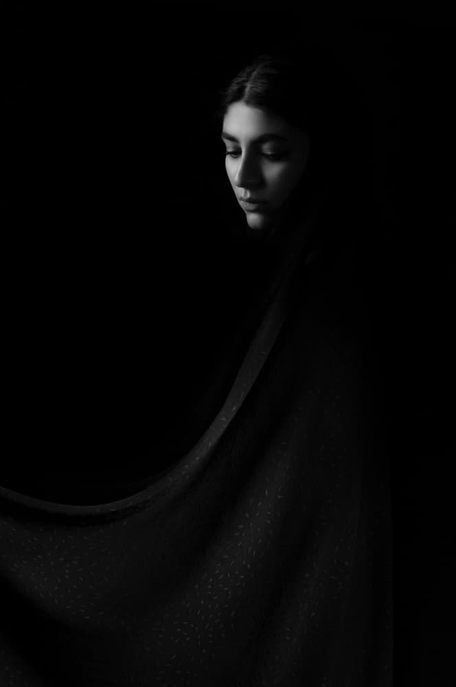 Pensive Woman In Shadow by Saeed Zamani — canvas wall art