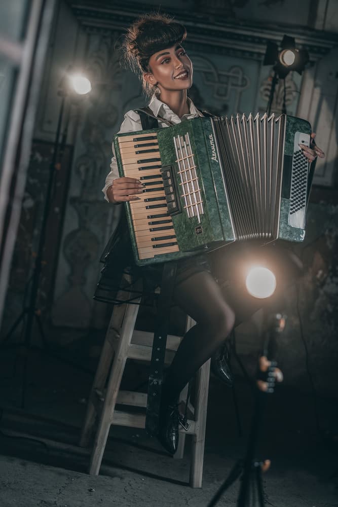 Smiling Accordion Player by amir behzadi — canvas wall art
