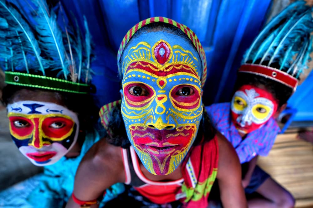 Colorful Painted Faces by Avishek Das — canvas wall art