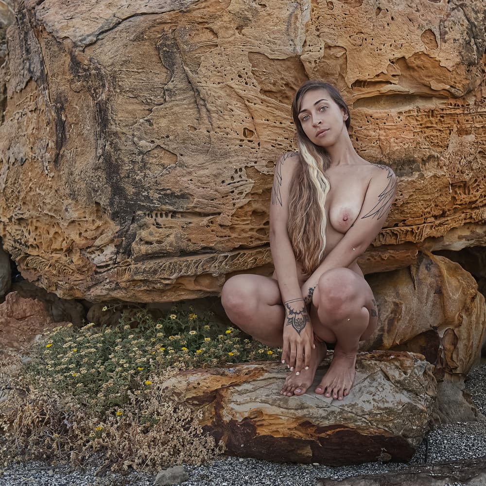 Natural Woman On Rocks by michel genève — canvas wall art