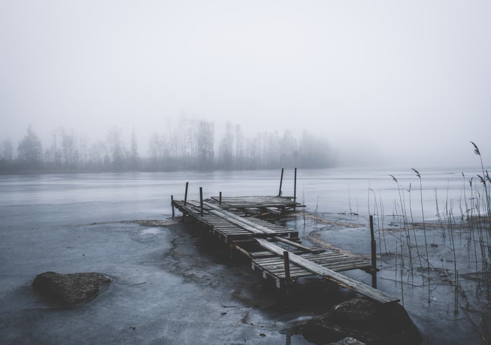Misty Dock on Frozen Lake by Christian Lindsten — canvas wall art