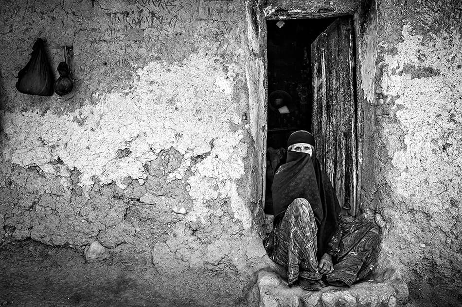 Veiled Woman in Doorway by Mohammadreza Momeni — canvas wall art