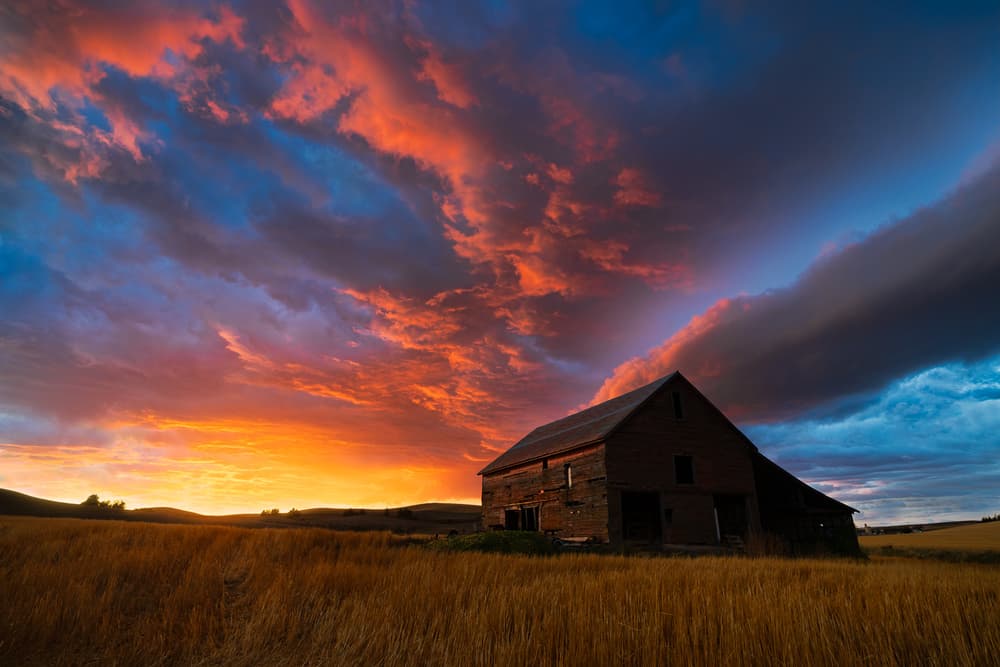 Vibrant Sunset Barn by John Fan — canvas wall art