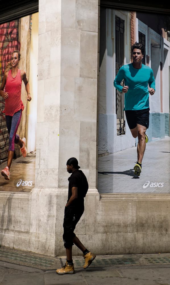 Urban Stroll By Runners by Lorenzo Grifantini — canvas wall art