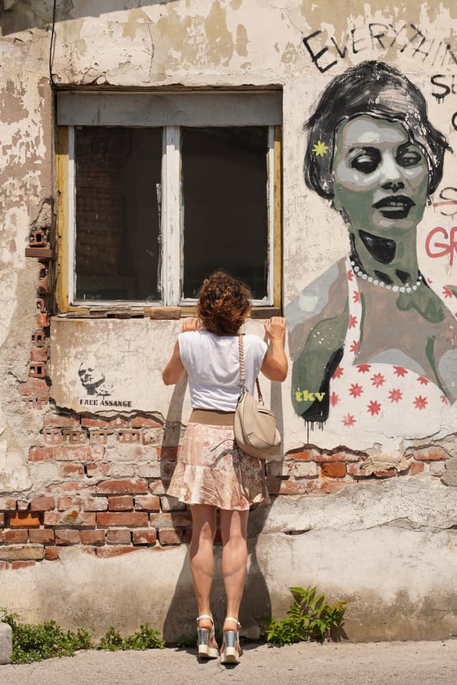 Woman Views Street Art by Miodrag Kosanovic — canvas wall art