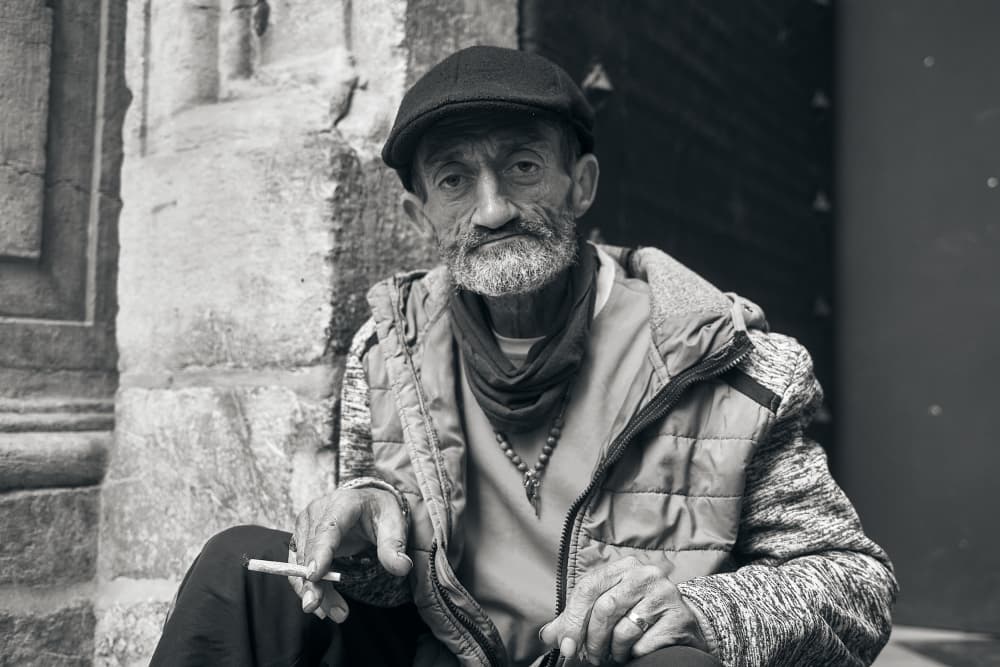 Pensive Man with Cigarette by Sergii Puchkov — canvas wall art