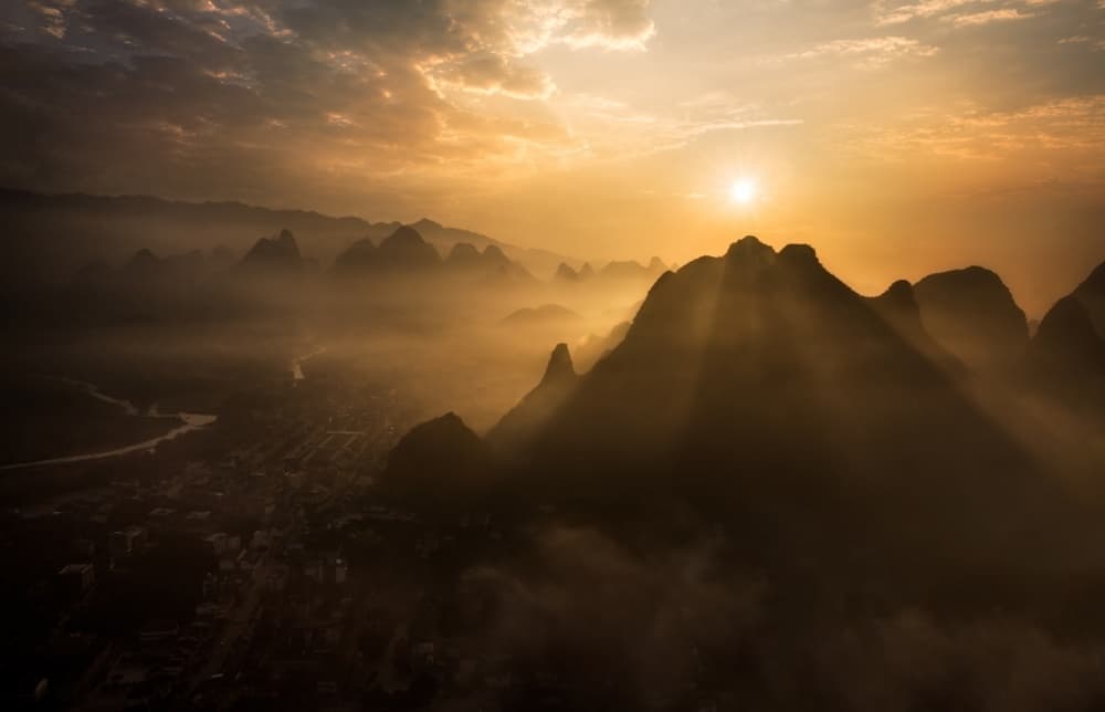 Misty Mountain Sunrise by Nadav Jonas — canvas wall art