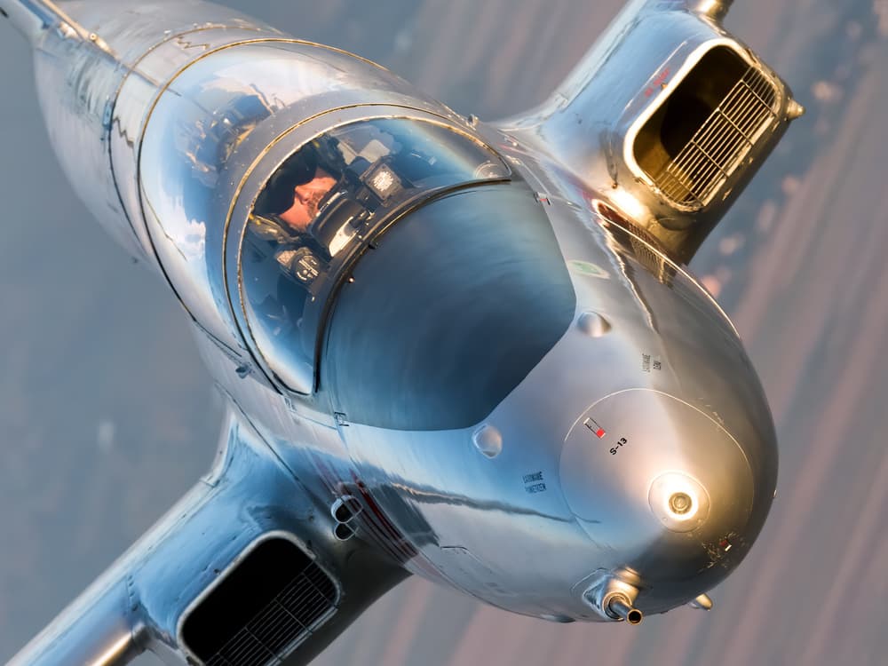Flying Silver Jet by Piotr Wrobel — canvas wall art