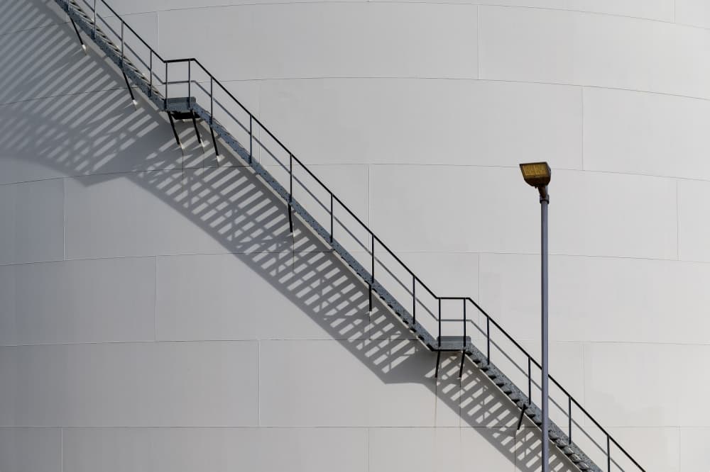 Industrial Staircase Shadows by Wim Schuurmans — canvas wall art