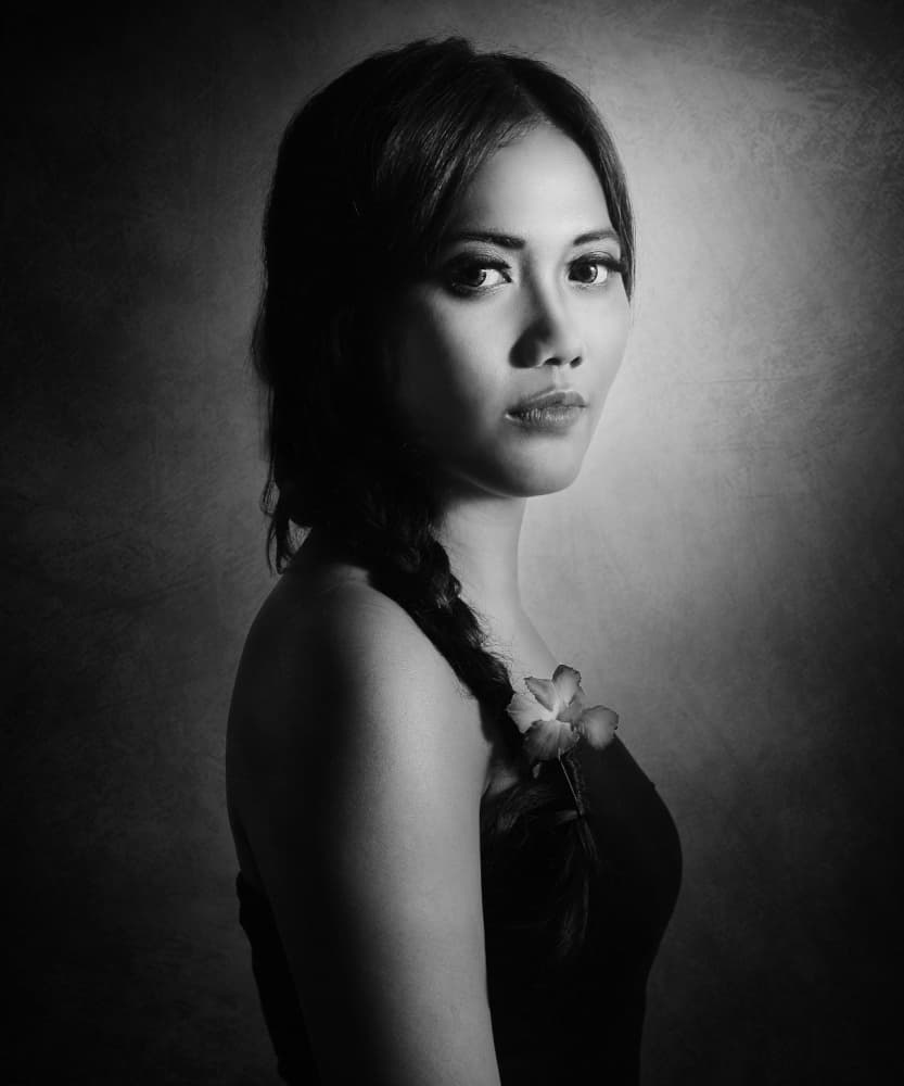 Elegant Woman's Gaze by Ivan Marlianto — canvas wall art