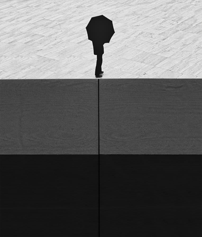 Solitary Figure Umbrella by Paulo Abrantes — canvas wall art