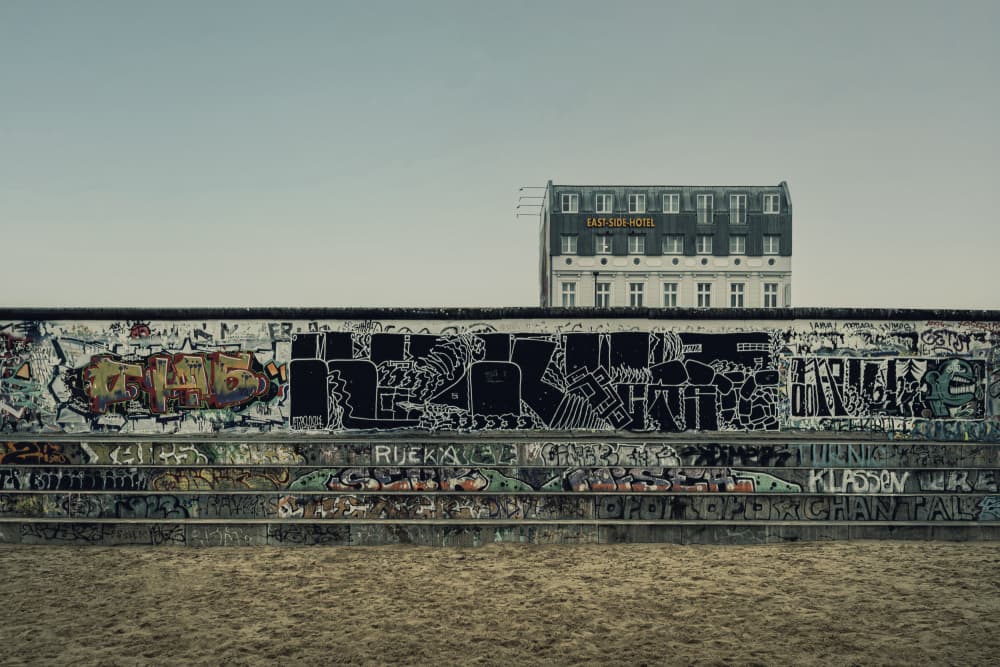 Berlin Wall Graffiti Hotel by Simon H — canvas wall art