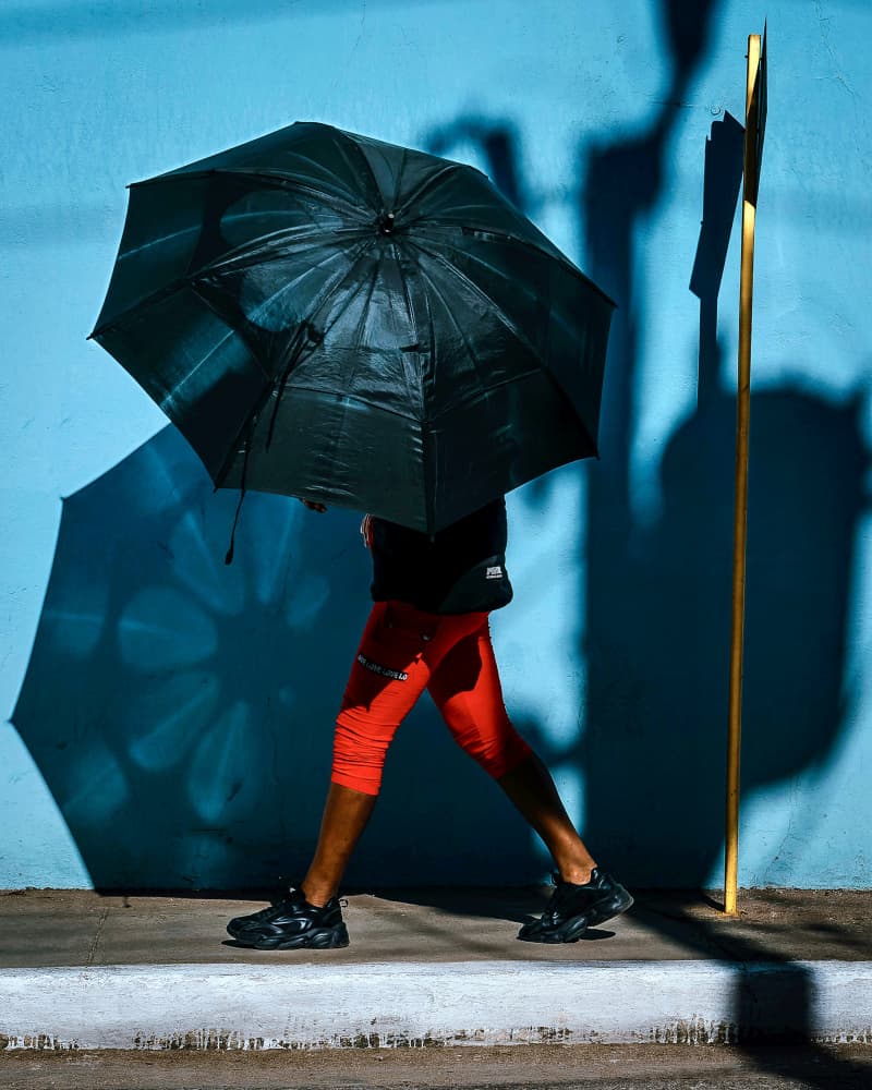Vibrant Umbrella Shadow Walk by Andy Bauer — canvas wall art