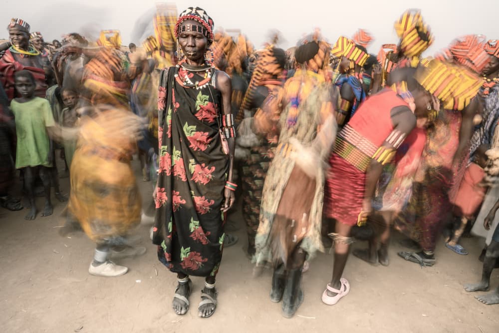 Still Woman Moving Crowd by Trevor Cole — canvas wall art