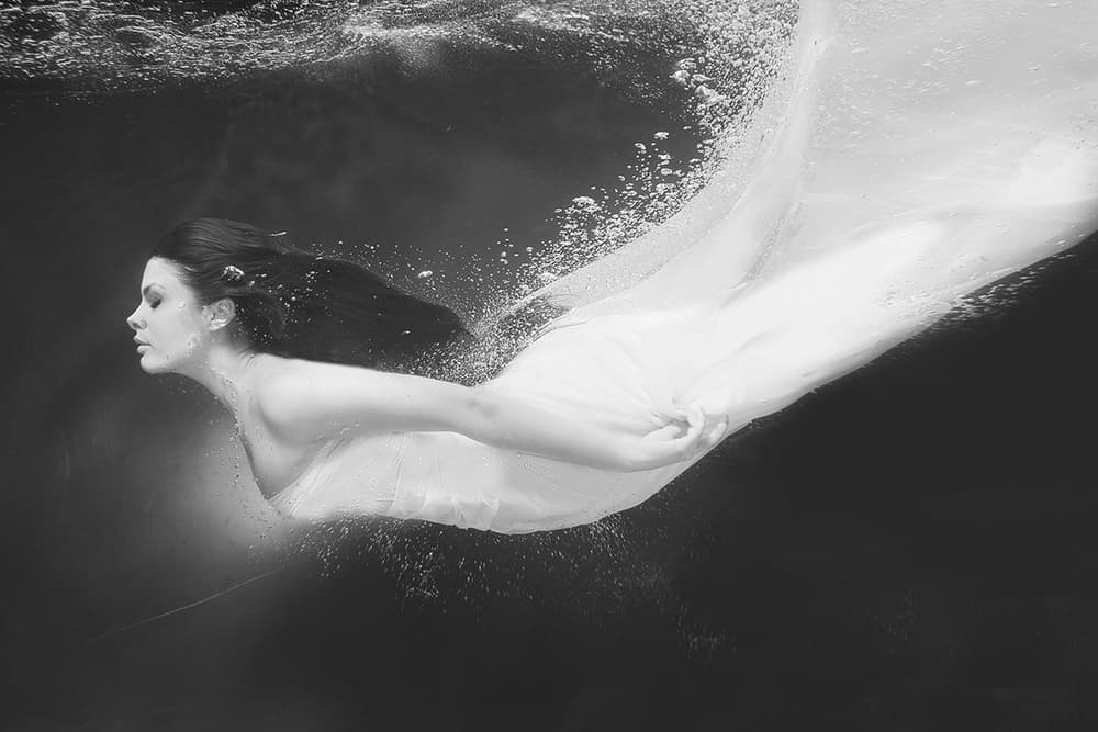 Ethereal Swimmer in White by Mike Darzi — canvas wall art