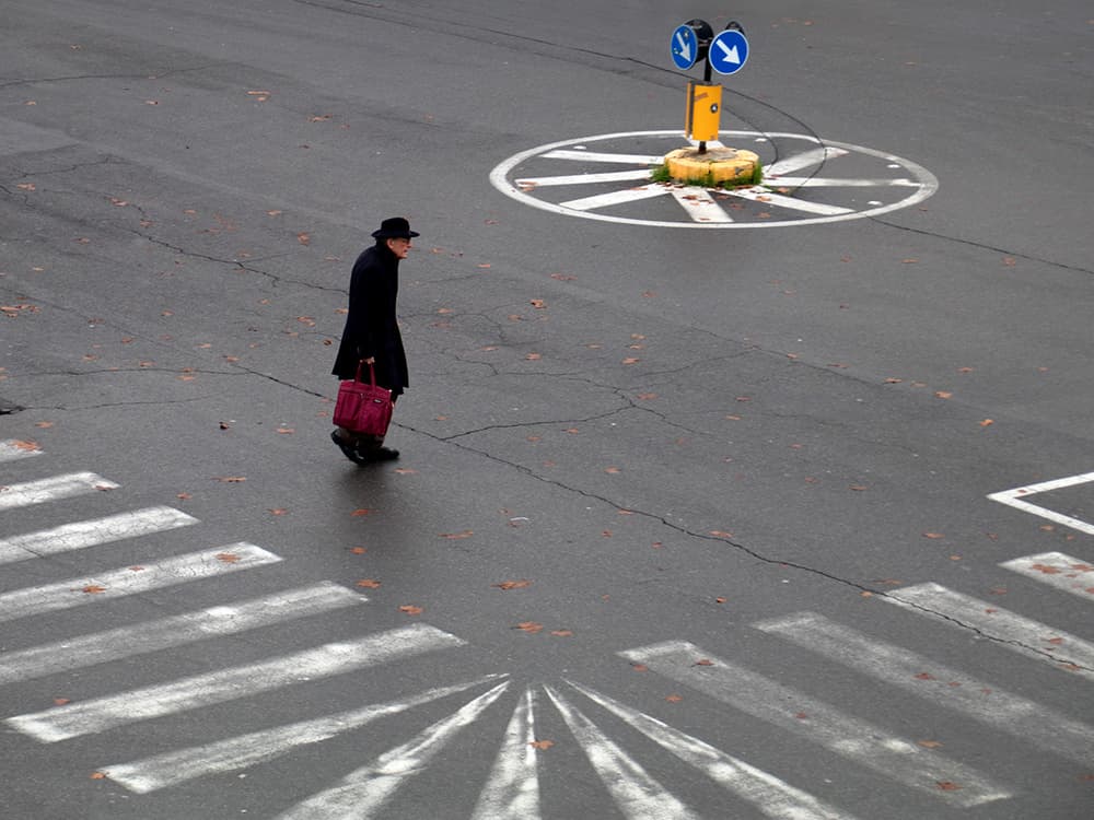 Man Crossing Urban Street by Massimo Della Latta — canvas wall art