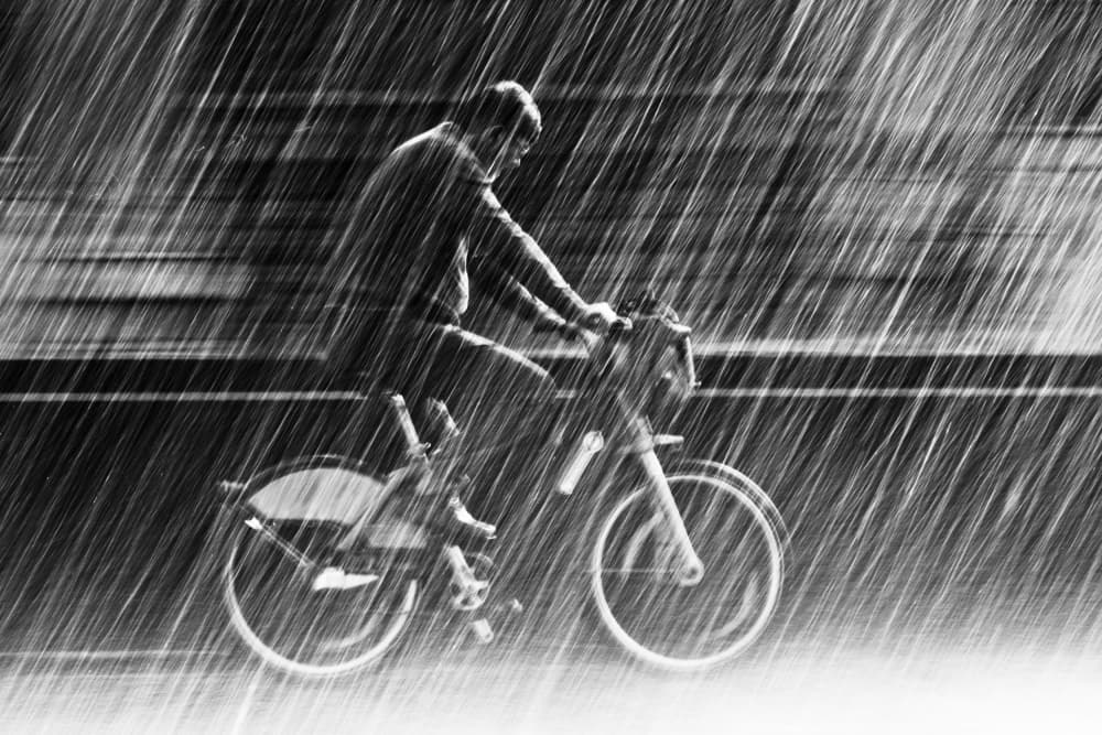 Rainy Urban Ride by Christian Müller — canvas wall art