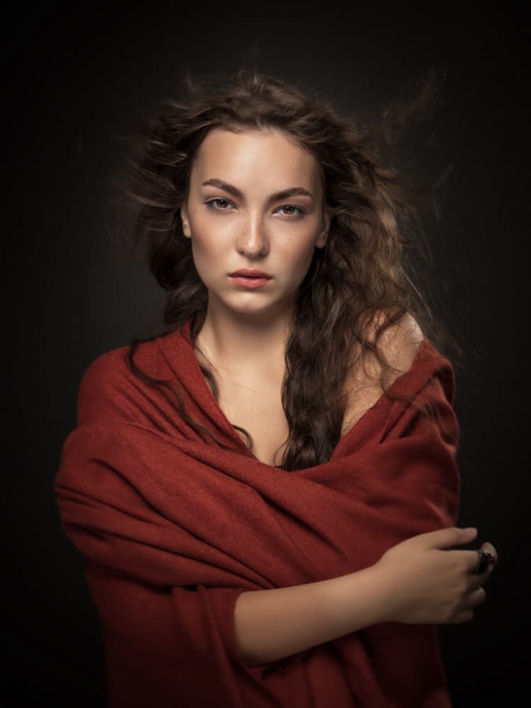 Pensive Woman in Red by Robert Girmencea — canvas wall art