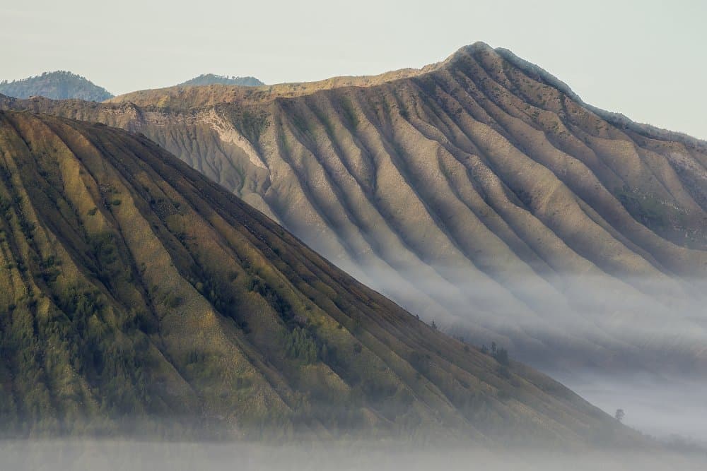 Misty Mountain Slopes by Andy Ritonga — canvas wall art