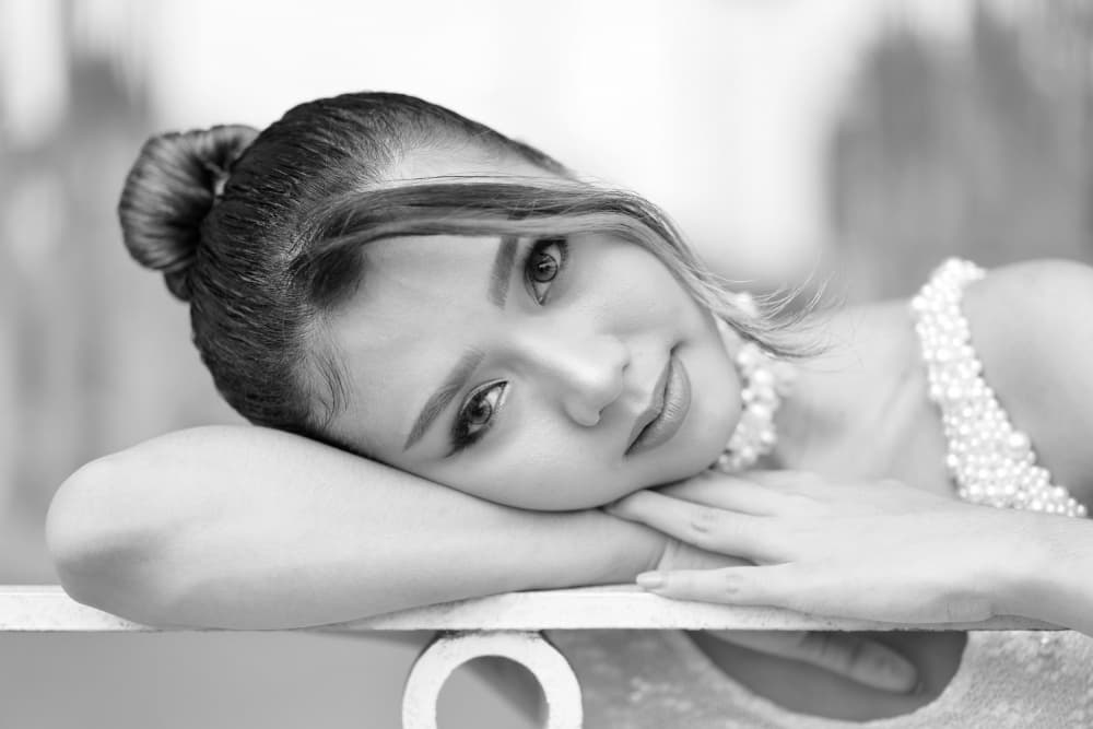 Serene Woman in Pearls by Kieron Long — canvas wall art