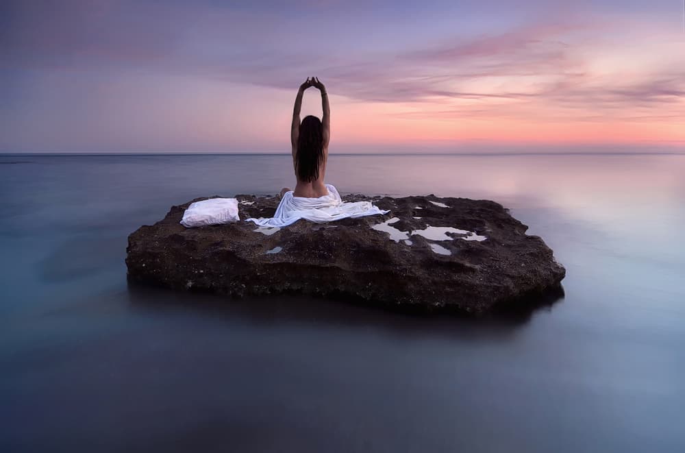 Woman at Sunset Meditation by Maria Kaimaki — canvas wall art