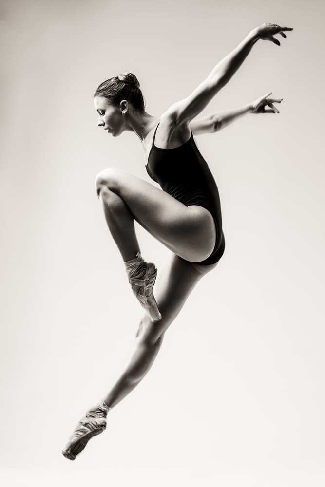 Elegant Ballerina Leap by Photographer — canvas wall art